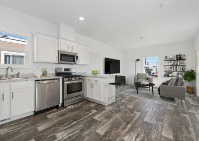 Model open kitchen and living room at Desert Valley Oasis Manufactured Homes in Mesa Arizona