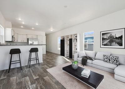 Model living room and kitchen at Desert Valley Oasis Manufactured Homes in Mesa Arizona